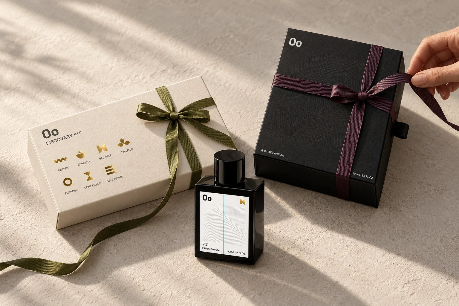 Frequency Discovery Kit and 100ml box styled with understated gift ribbons